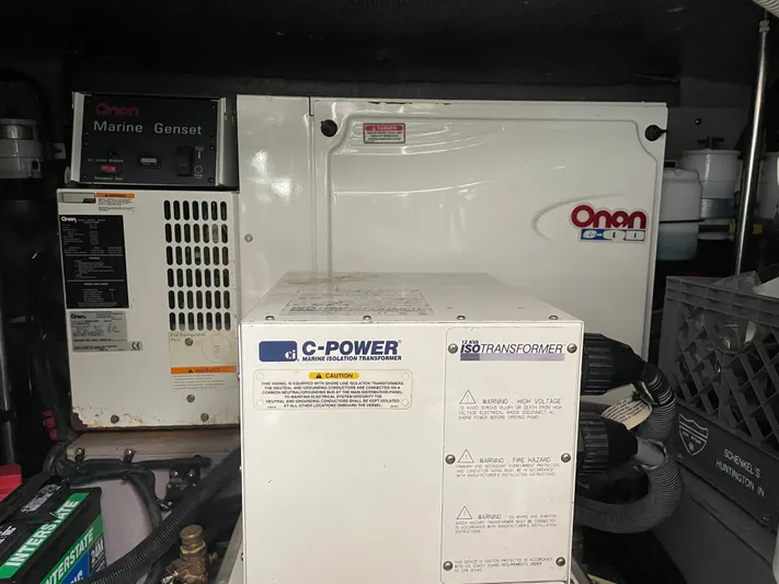 Lisa Ann Yacht Photos Pics Engine room of 2003 Sea Ray 460 Sundancer with Onan marine generator and C-Power transformer.