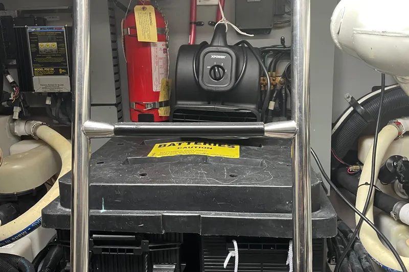 Lisa Ann Yacht Photos Pics Engine room of 2003 Sea Ray 460 Sundancer with battery compartment and fire extinguisher.