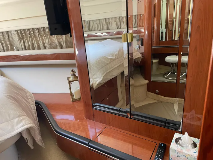 Lisa Ann Yacht Photos Pics Luxurious interior of 2003 Sea Ray 460 Sundancer yacht with elegant wood finishes.