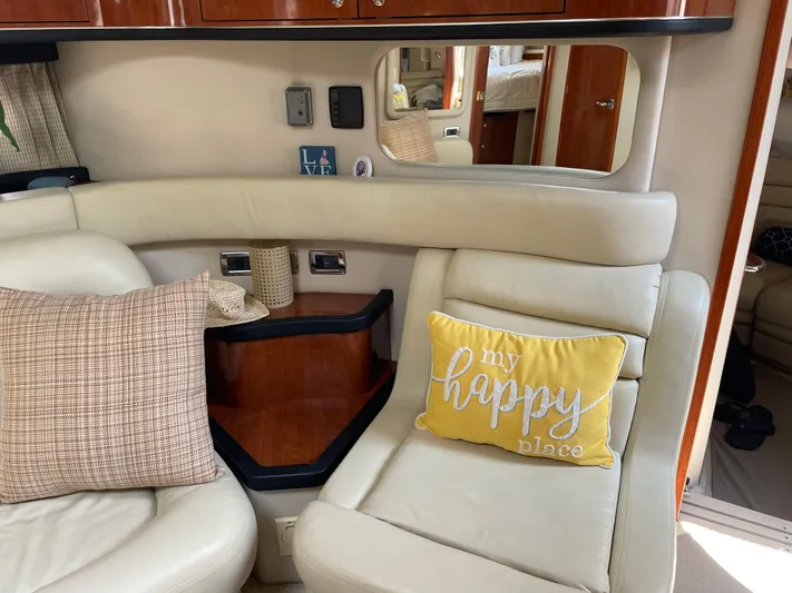 Lisa Ann Yacht Photos Pics Luxurious 2003 Sea Ray 460 Sundancer interior with cozy seating and decorative pillows.