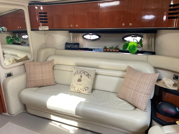 Lisa Ann Yacht Photos Pics Luxurious interior of 2003 Sea Ray 460 Sundancer yacht with comfortable seating and decor.