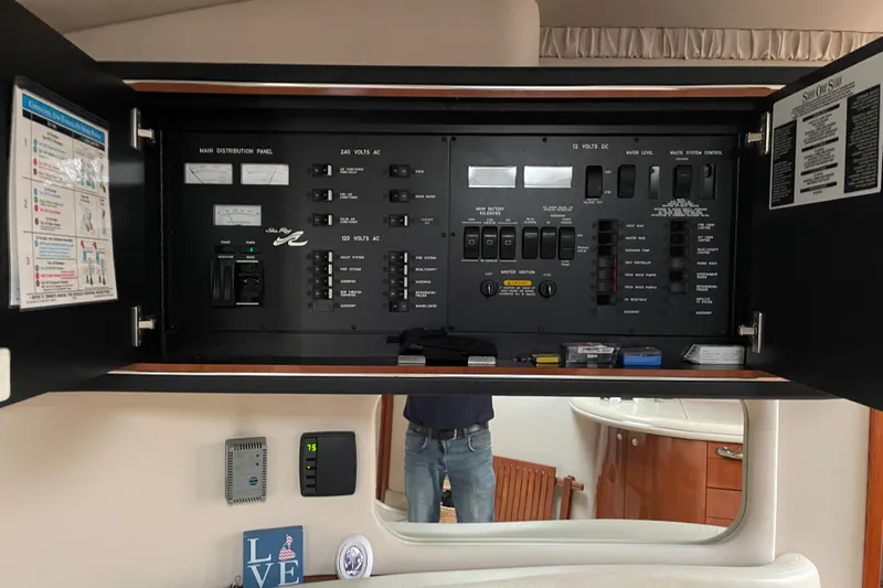 Lisa Ann Yacht Photos Pics Electrical panel inside a 2003 Sea Ray 460 Sundancer yacht cabin.