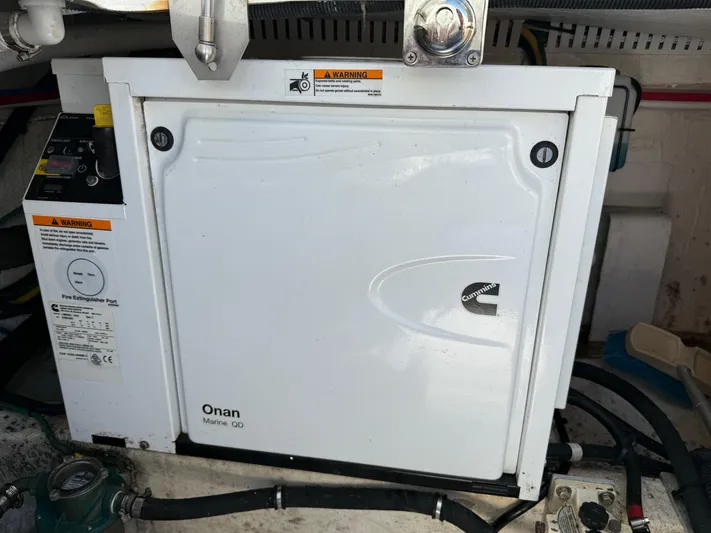 Wahoowa Yacht Photos Pics 2019 Back Cove Downeast boat with Onan Marine QD generator in engine compartment.