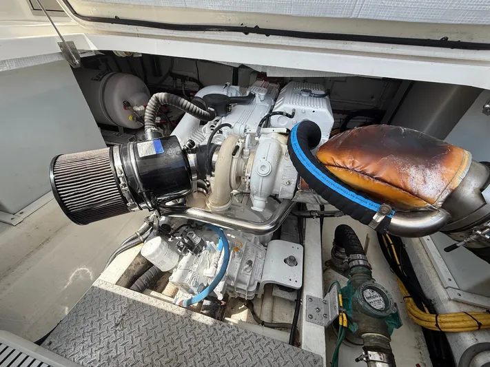 Wahoowa Yacht Photos Pics Engine compartment of a 2019 Back Cove Downeast boat, showcasing mechanical components.