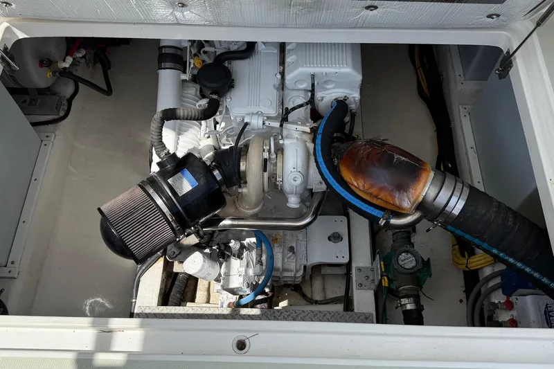 Wahoowa Yacht Photos Pics Engine compartment of a 2019 Back Cove Downeast boat, showcasing mechanical components.