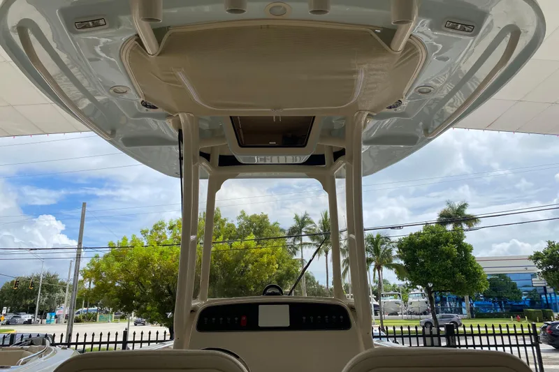  Yacht Photos Pics 2026 Grady-White Fisherman 236 boat interior with overhead view and outdoor scenery.