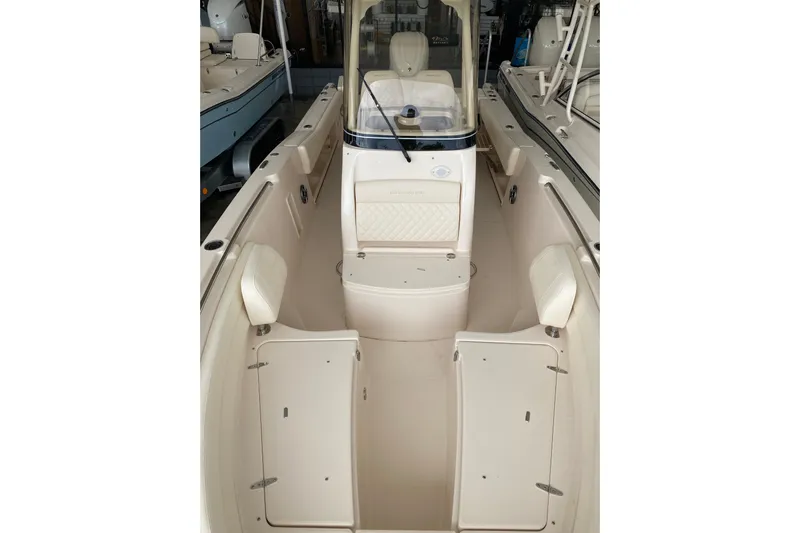  Yacht Photos Pics 2026 Grady-White Fisherman 236 boat interior with seating and storage compartments.