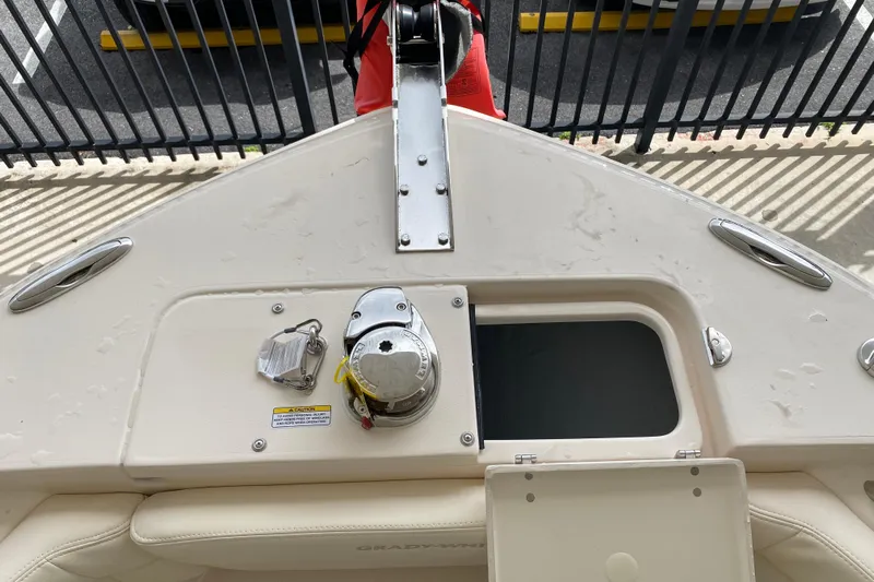  Yacht Photos Pics 2026 Grady-White Fisherman 236 boat deck with anchor storage and winch system.