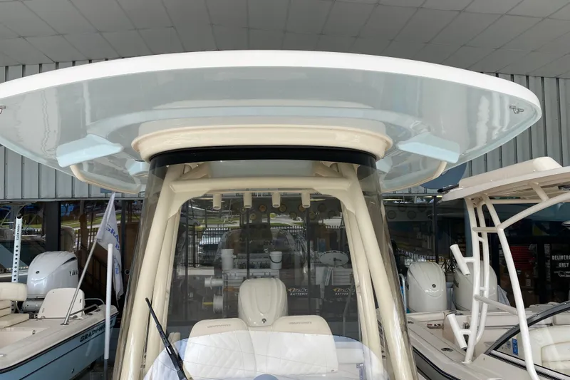  Yacht Photos Pics 2026 Grady-White Fisherman 236 boat, showcasing helm and T-top design.