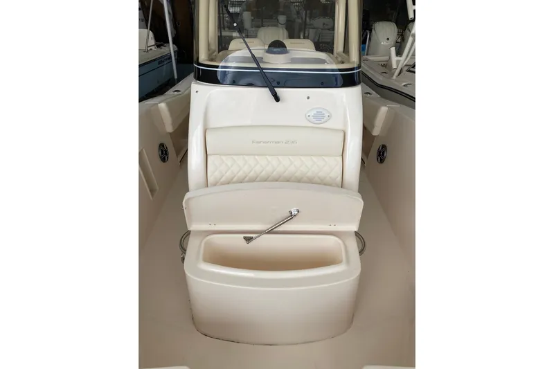 Yacht Photos Pics 2026 Grady-White Fisherman 236 boat interior with seating and storage compartment.