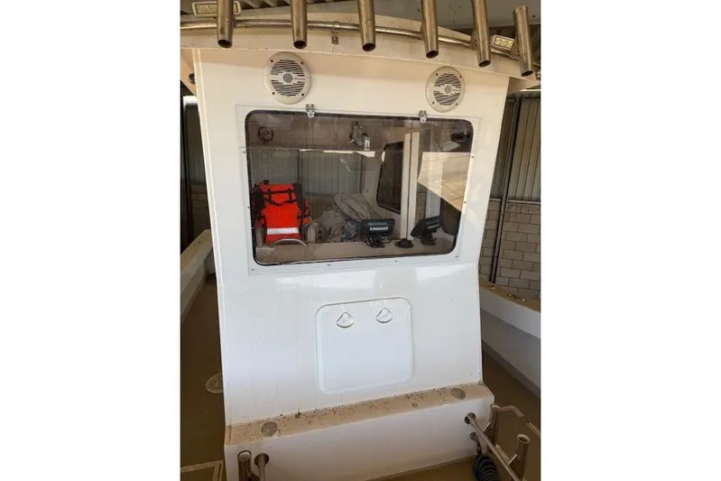  Yacht Photos Pics 2021 28 Custom Line Pilot House Catamaran interior with equipment and life jacket.