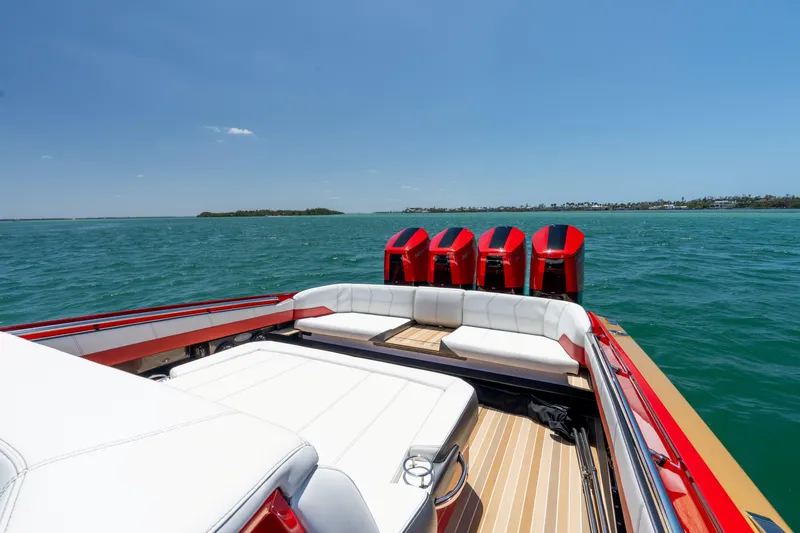 Lady Lisa Yacht Photos Pics 2023 Nor-Tech 55 Flyer boat with red engines on open water.