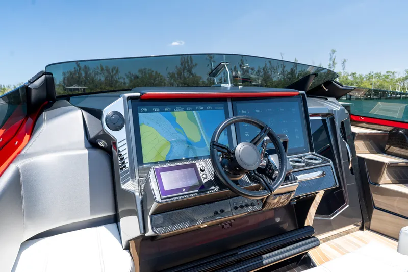 Lady Lisa Yacht Photos Pics Cockpit of 2023 Nor-Tech 55 Flyer with advanced navigation displays and steering wheel.