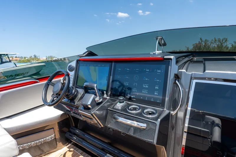 Lady Lisa Yacht Photos Pics 2023 Nor-Tech 55 Flyer dashboard with advanced navigation and control systems.