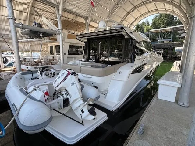 Va Bene Yacht Photos Pics 2015 Sea Ray 470 Sundancer yacht docked with inflatable boat attached.