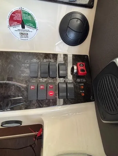 Va Bene Yacht Photos Pics Control panel of 2015 Sea Ray 470 Sundancer boat with switches and indicators.