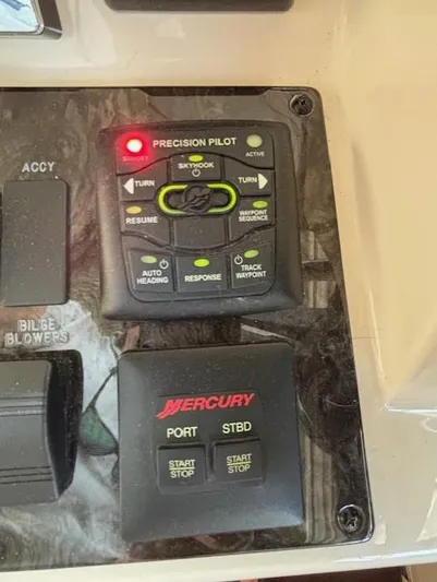 Va Bene Yacht Photos Pics Control panel of a 2015 Sea Ray 470 Sundancer with Mercury Precision Pilot system.