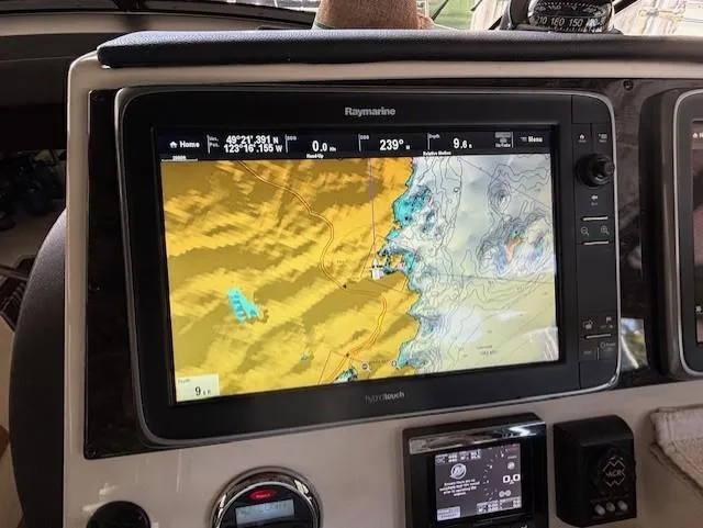 Va Bene Yacht Photos Pics Navigation system on 2015 Sea Ray 470 Sundancer displaying nautical chart.