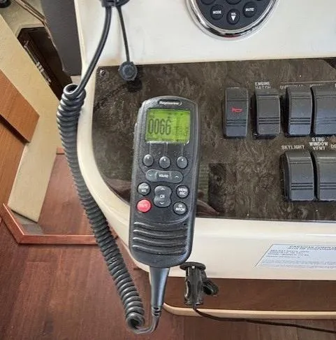 Va Bene Yacht Photos Pics Control panel of 2015 Sea Ray 470 Sundancer with radio handset and switches.