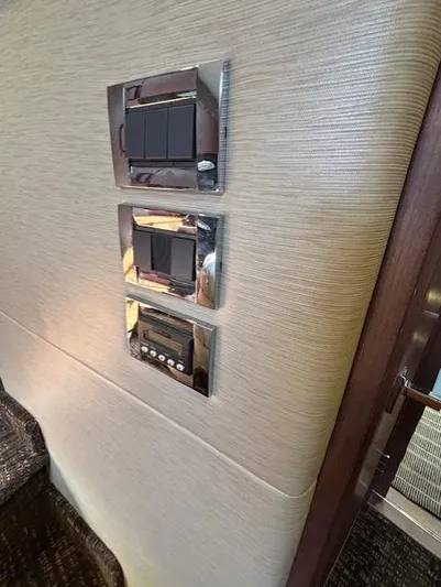 Va Bene Yacht Photos Pics Control panel on 2015 Sea Ray 470 Sundancer yacht interior wall.