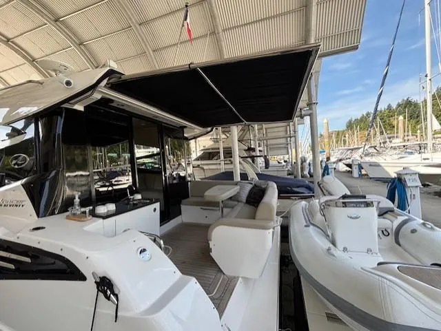 Va Bene Yacht Photos Pics 2015 Sea Ray 470 Sundancer yacht docked with inflatable boat nearby.