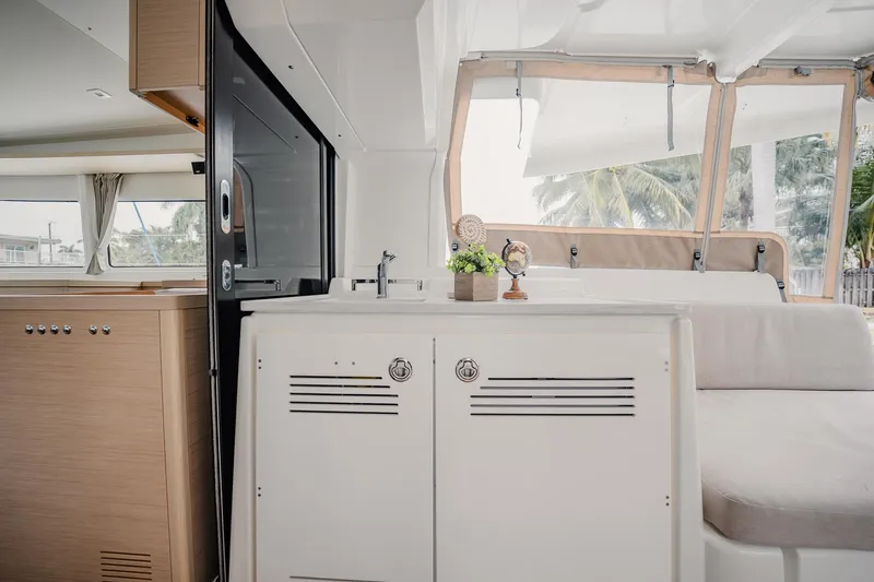  Yacht Photos Pics Interior of 2022 Lagoon 46 catamaran with modern design and comfortable seating.