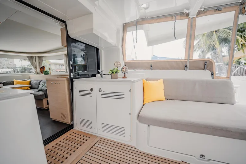  Yacht Photos Pics Interior of 2022 Lagoon 46 catamaran with modern seating and decor.