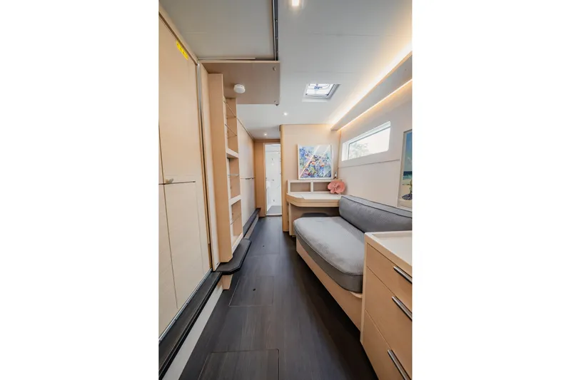  Yacht Photos Pics Modern interior of 2022 Lagoon 46 yacht with sleek design and comfortable seating.