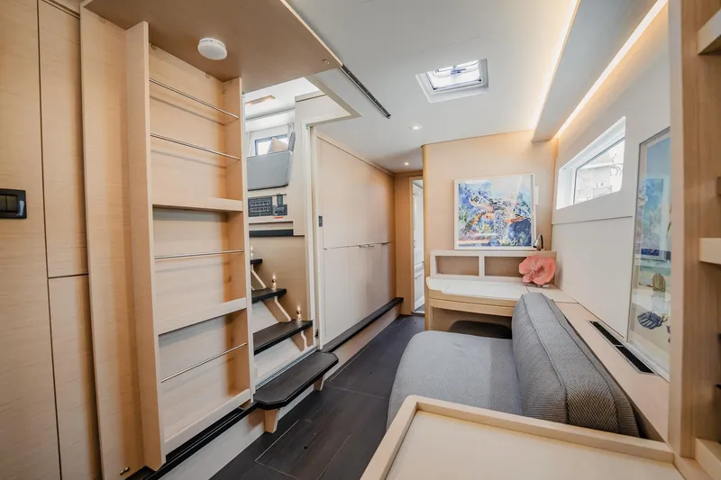  Yacht Photos Pics Luxurious interior of 2022 Lagoon 46 catamaran with modern design and natural lighting.