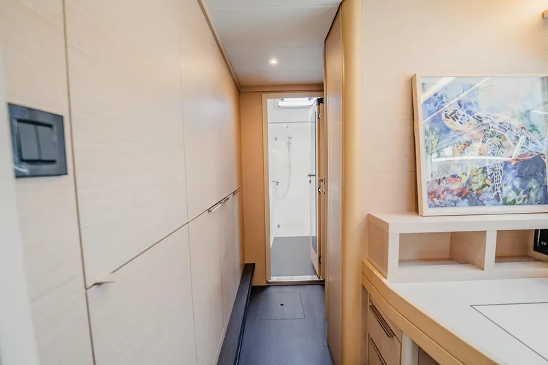  Yacht Photos Pics Interior of 2022 Lagoon 46 yacht with modern design and turtle artwork.