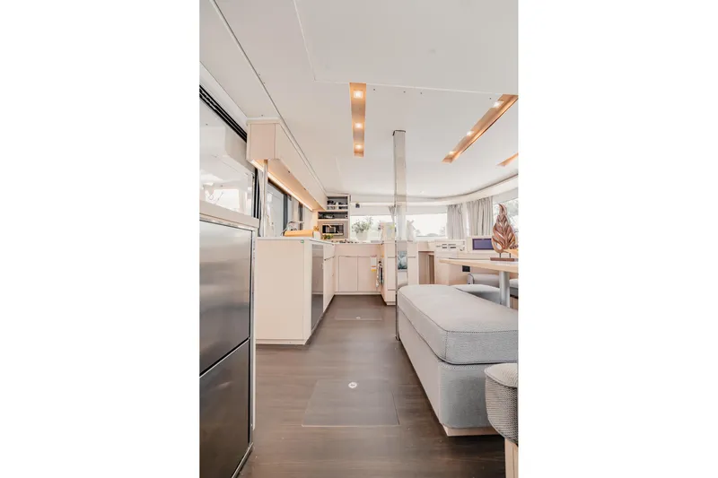  Yacht Photos Pics Modern interior of 2022 Lagoon 46 yacht with sleek design and spacious layout.