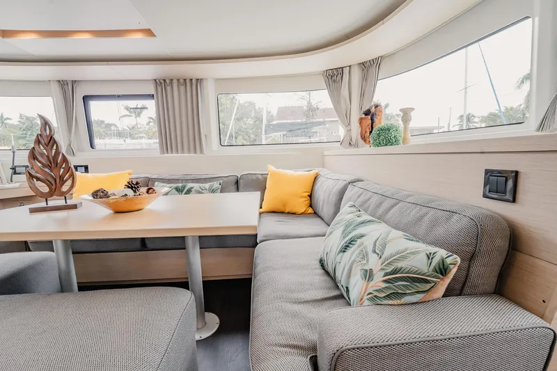  Yacht Photos Pics Luxurious interior of 2022 Lagoon 46 catamaran with stylish seating and decor.