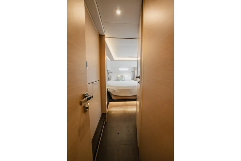  Yacht Photos Pics Interior view of 2022 Lagoon 46 yacht cabin with modern design.