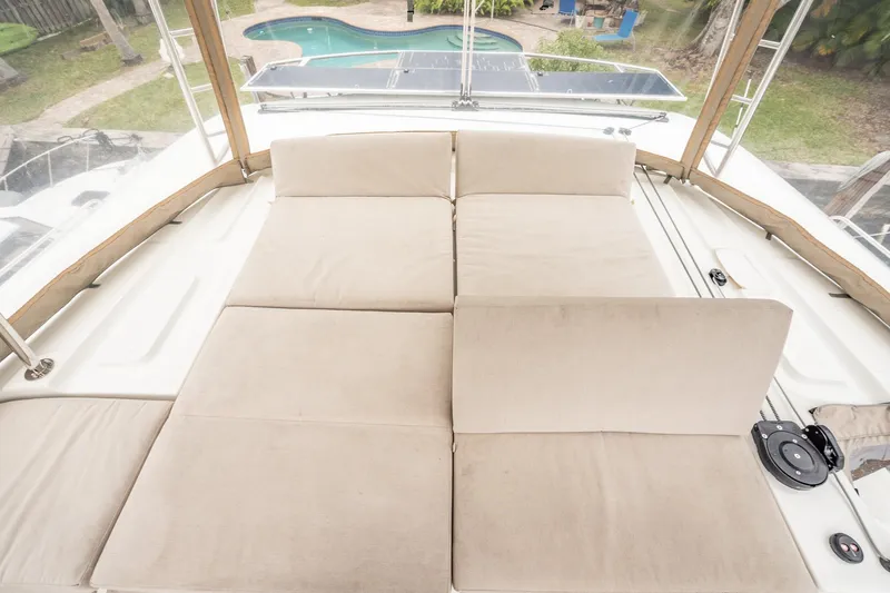  Yacht Photos Pics Luxurious sunbathing area on 2022 Lagoon 46 catamaran with pool view.