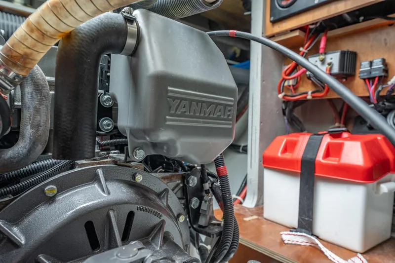  Yacht Photos Pics Engine compartment of 2022 Lagoon 46 catamaran with Yanmar components and battery box.