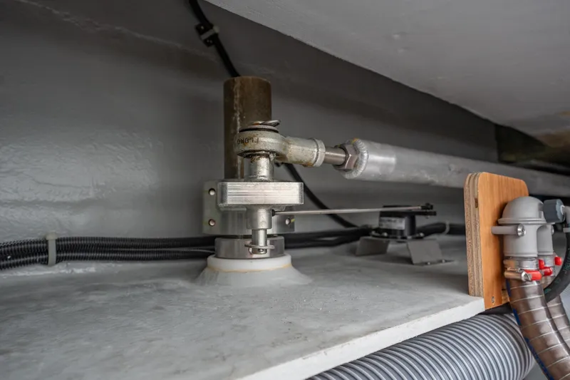  Yacht Photos Pics Interior mechanical components of a 2022 Lagoon 46 yacht, featuring pipes and fittings.