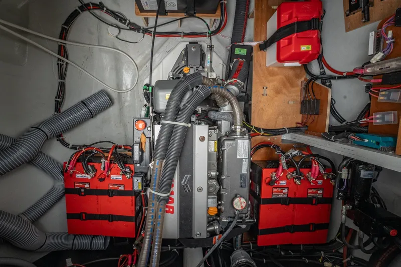  Yacht Photos Pics Engine room of a 2022 Lagoon 46 catamaran with batteries and wiring.