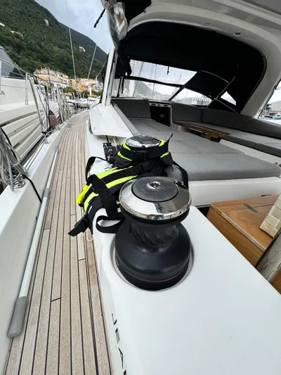 Blue Art Yacht Photos Pics 2023 Jeanneau 65 yacht deck with winches and seating area.