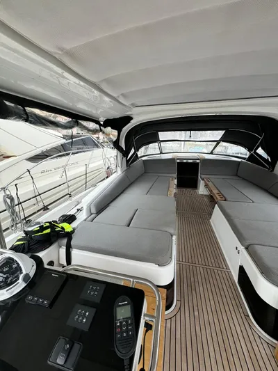 Blue Art Yacht Photos Pics 2023 Jeanneau 65 yacht interior with spacious seating and modern design.