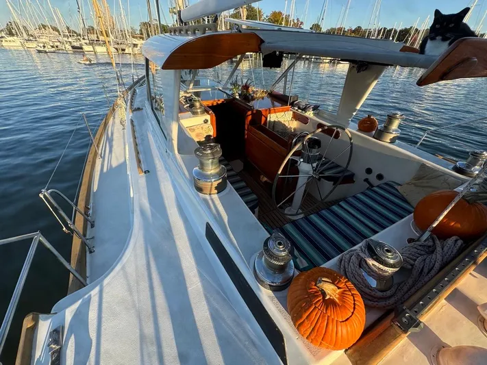 Pacific High Yacht Photos Pics Sailboat deck with pumpkins, Custom 62 model, 1983, docked in marina.
