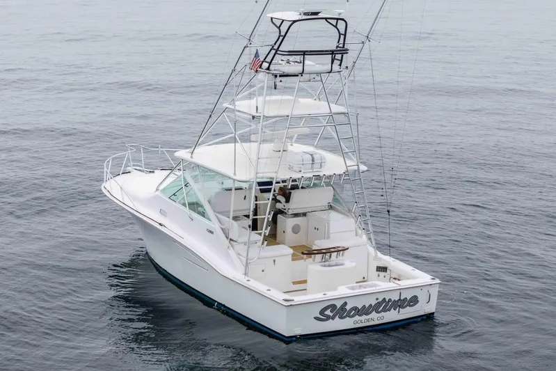 Show Time Yacht Photos Pics 2008 Cabo Yachts 38 EXPRESS fishing boat on calm ocean waters.