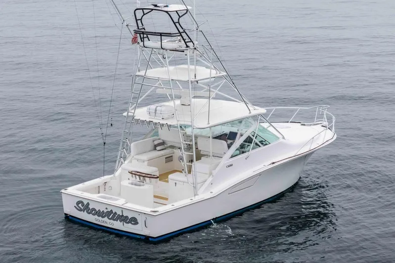 Show Time Yacht Photos Pics 2008 Cabo Yachts 38 EXPRESS fishing boat on calm ocean waters.