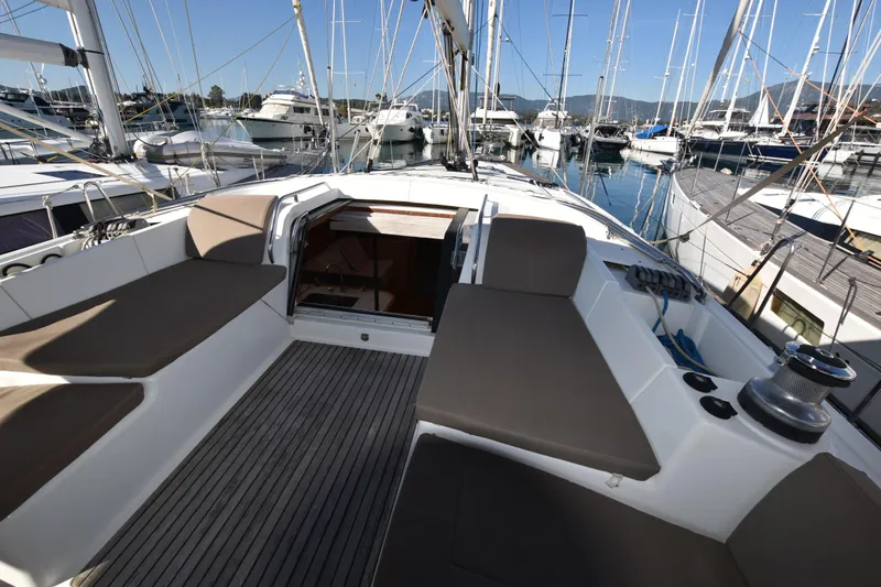 Lady Evelina Yacht Photos Pics Spacious cockpit of 2010 Jeanneau 57 yacht docked in marina.