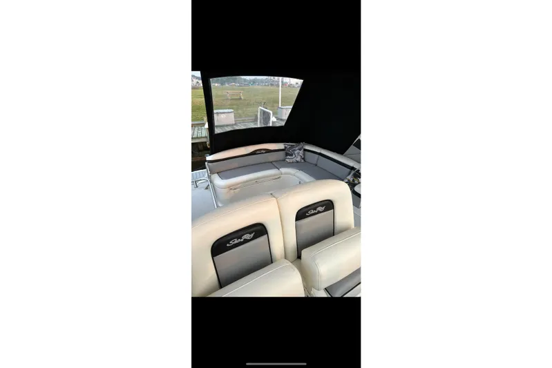  Yacht Photos Pics Interior view of 2008 Sea Ray 350 Sundancer with comfortable seating and cushions.