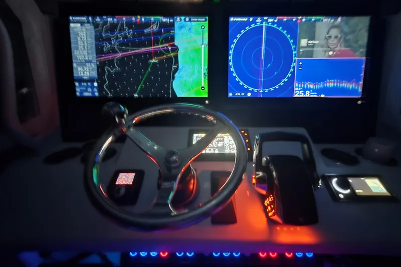 Wanderlust Yacht Photos Pics 2024 Costa Custom Boats 34 SV dashboard with navigation screens and controls.
