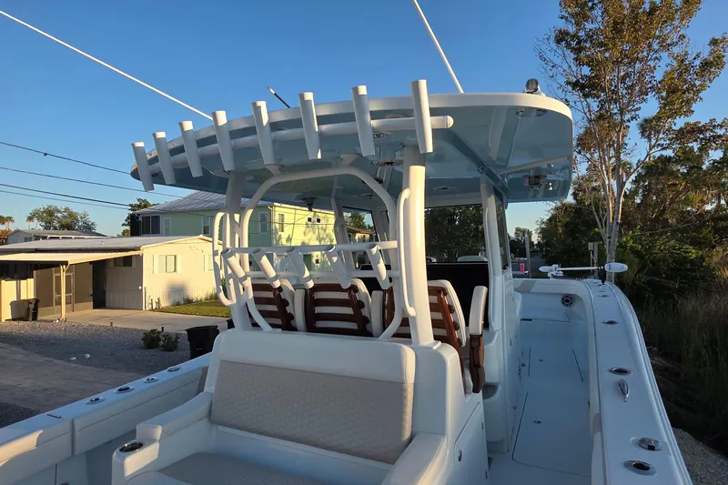 Wanderlust Yacht Photos Pics 2024 Costa Custom Boats 34 SV, sleek design, spacious deck, modern seating, outdoor setting.