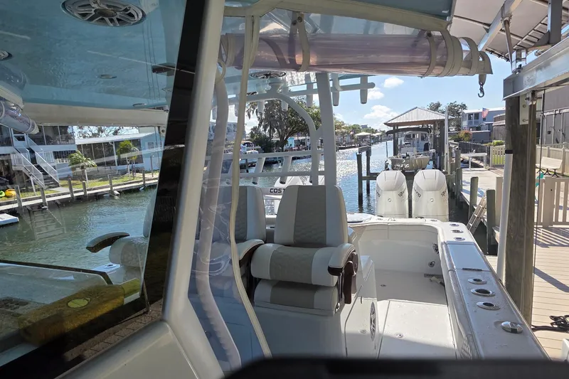 Wanderlust Yacht Photos Pics 2024 Costa Custom Boats 34 SV docked, showcasing sleek design and modern features.