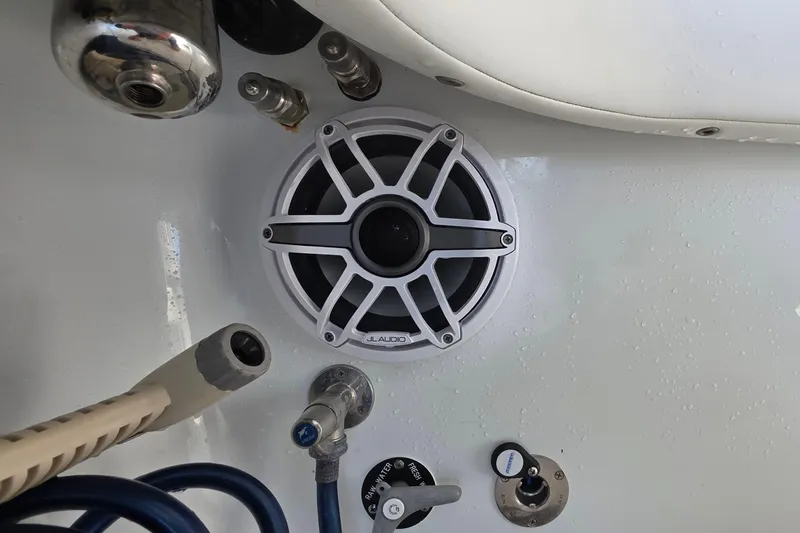 Wanderlust Yacht Photos Pics 2024 Costa Custom Boats 34 SV featuring JL Audio speaker and water hose connections.