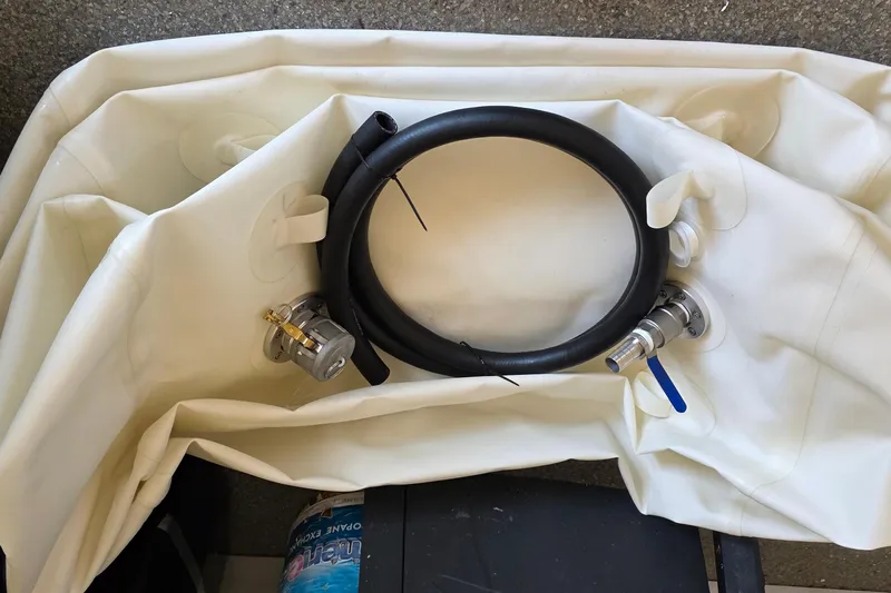 Wanderlust Yacht Photos Pics 2024 Costa Custom Boats 34 SV components, including hoses and valves, on white fabric.