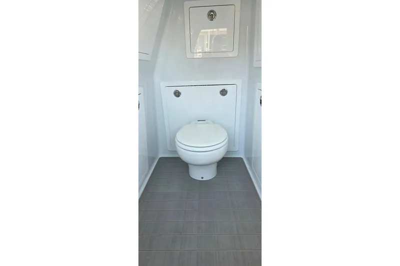 Wanderlust Yacht Photos Pics 2024 Costa Custom Boats 34 SV interior bathroom with modern toilet and sleek design.